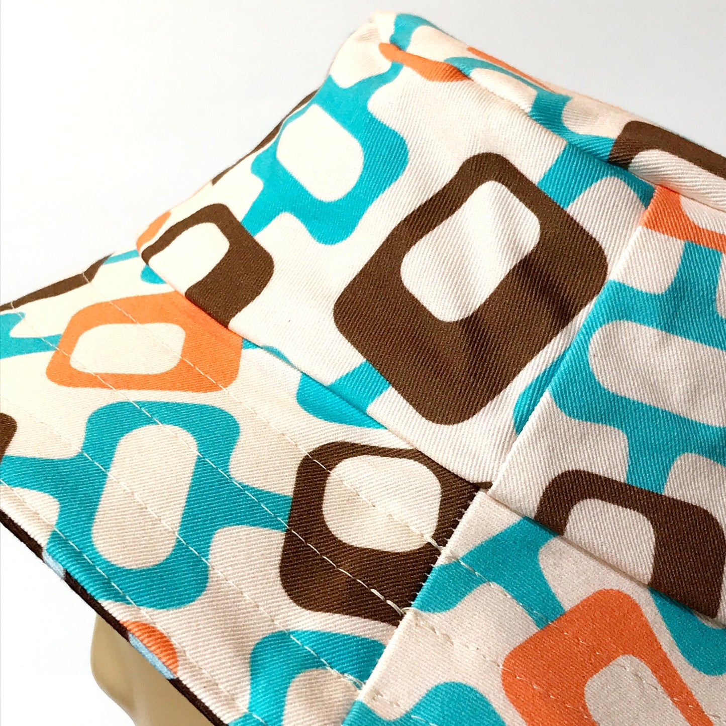 Reversible Bucket Hat - sizes 3 mths - 6 yrs - brown geometric print
