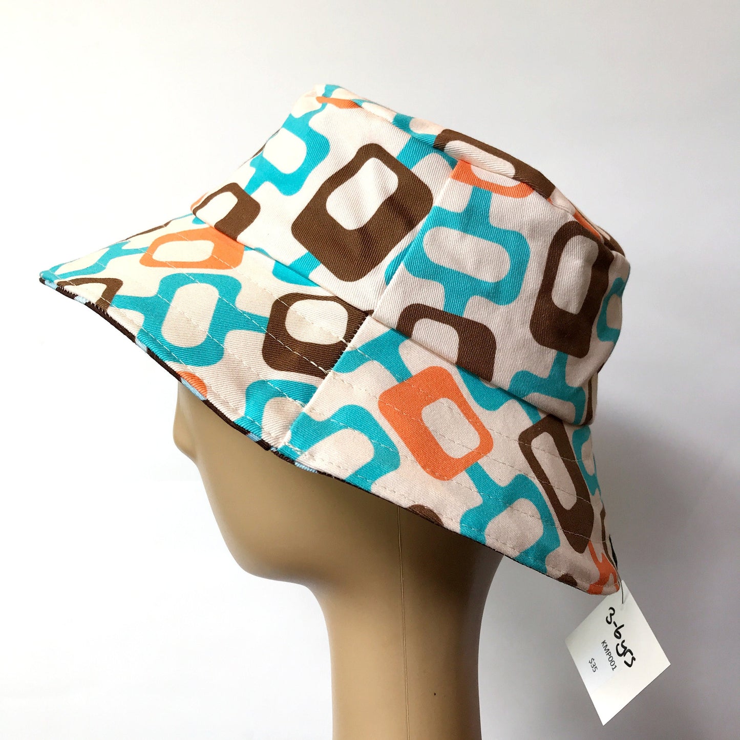 Reversible Bucket Hat - sizes 3 mths - 6 yrs - brown geometric print